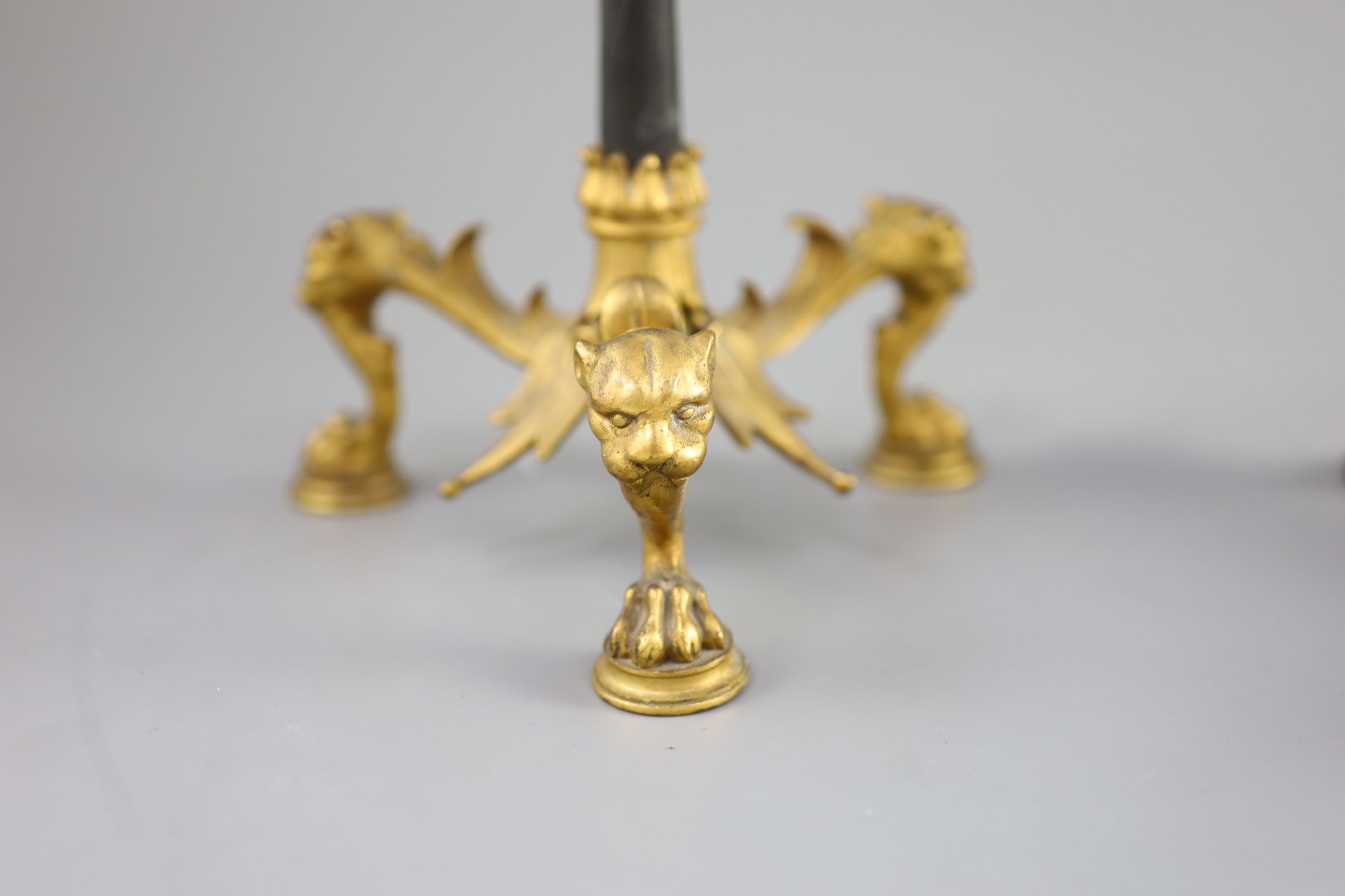 A pair of Barbedienne style five branch ormolu candelabra, 19th century, 52cm high